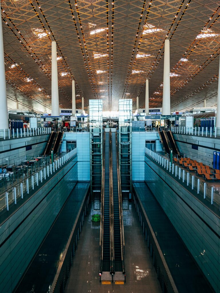 Grand view of the architecture and interior design at Beijing Capital International Airport.